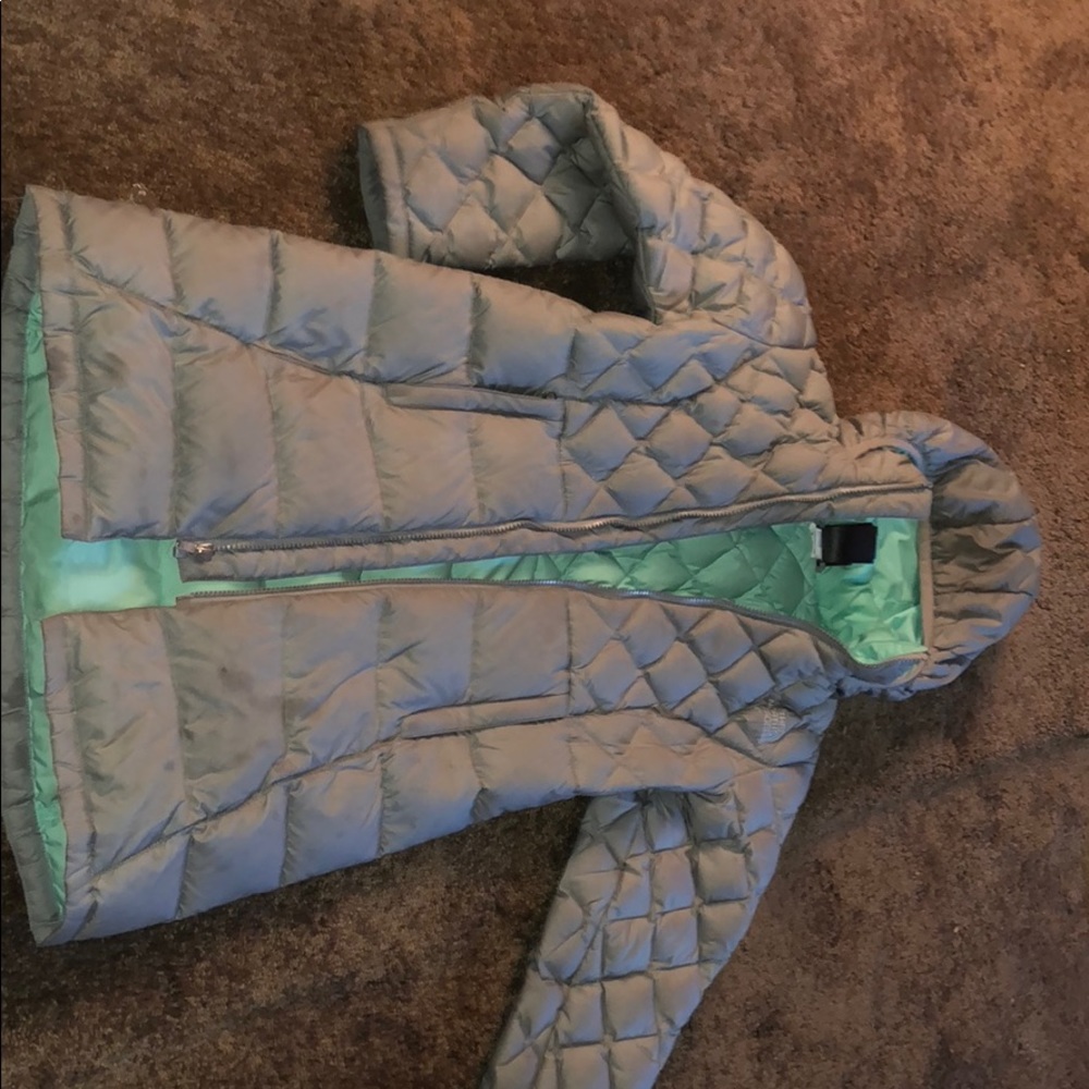 A gray and teal coat